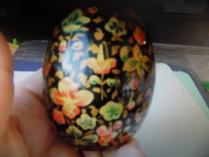 Porcelain egg handpainted flowers with dark background 