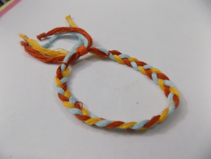 Woven bracelet, brown, blue and yellow