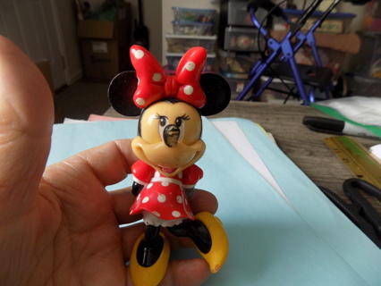 Vintage Disney Minnie Mouse rattle toy 2004 holds yellow present 5 inch