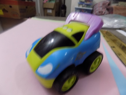 3 inch long green, blue and purple push car high fin in rear lime green wheels