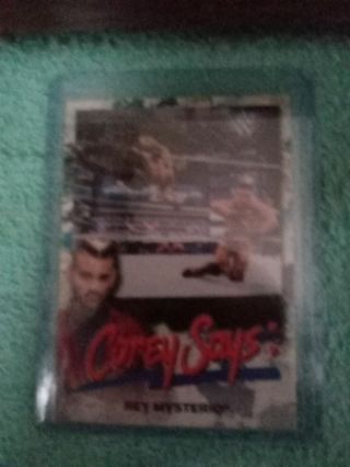 WWE smackdown Topps trading card of Corey says Rey Mysterio insert card from 2019