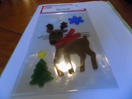 NIP window gel clings reindeer with red scarf, tree, stars, snowflakes