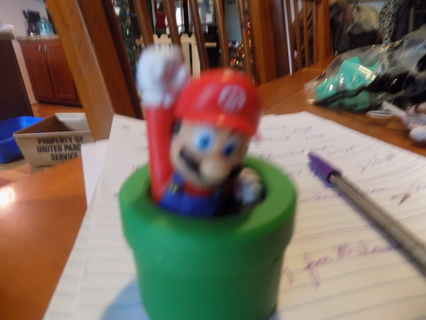 Mario of Mario Brothers McDonalds toy in green pipe