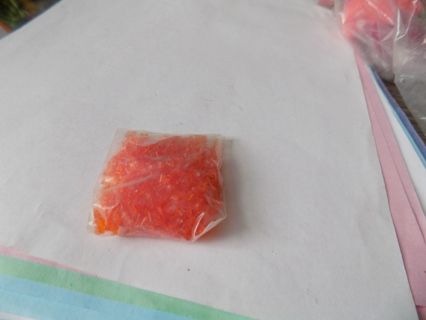 Small baggie orange cooking crystals for crafts