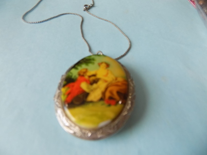 Vintage Victorian enamel Mother & child oval locket, serpentine chain holds 2 photos