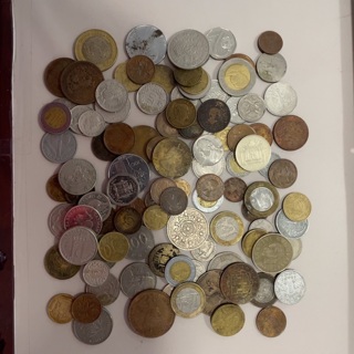 100+ foreign coins “potluck” pile