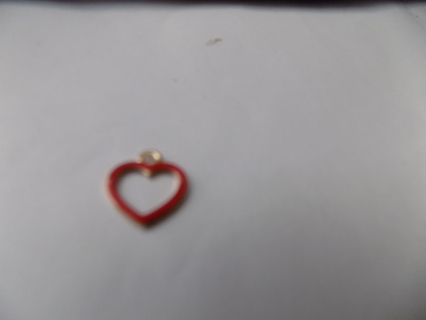 Red enameled hollow heart charm
