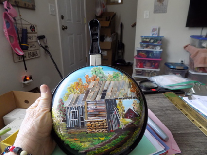 Hand painted cabin scene painted on back of a new skillet made into a wallhanging