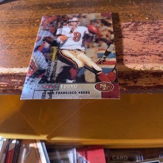 1999 topps finest Steve young football card w/coating 