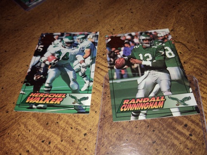 Two card lot eagles football veteran Randall Cunningham and Herschel Walker