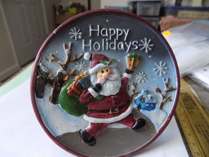 5 inch round resin decorative 3D plate Santa walking to a house easel back