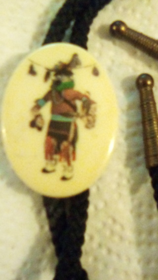 Bolo tie with sliding indian on plastic