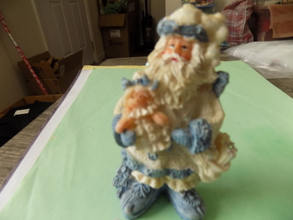 4 inch Father Christmas dressed in blue holds baby doll # 2