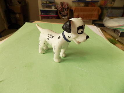 Disney pup of 101 Dalmations square around eye tail straight out