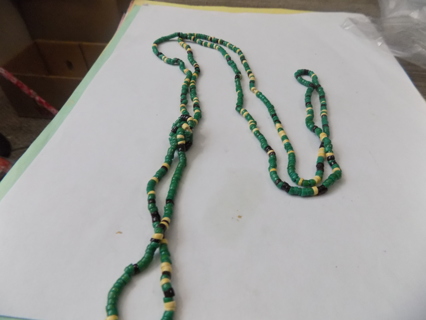 Necklace long strand small green, yellow and black beads