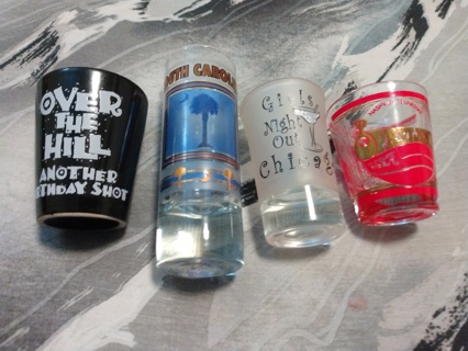4 Shot Glasses ( All in Great Condition)