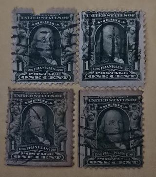 Four Vintage Used .01 Benjamin US Postage Stamps