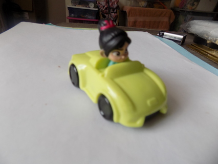 Disney's Vanelliopie Von Schweetz driving yellow car from Wreck it Ralph