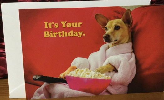 Dog Wearing Robe Having Popcorn Birthday Card