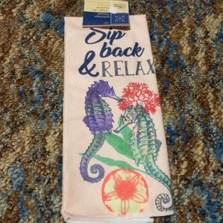 One decorative seahorse hand towel