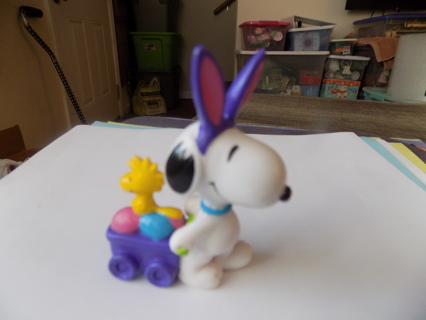 Vintage 2 1/2 inch tall Snoopy as Easter bunny pulling wood wagon of eggs