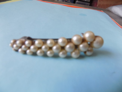 hair barrette covered in graduating size pearls 2 1/2 inch long