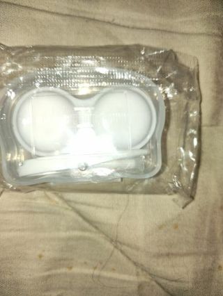 New in package Clear Contact Lens Kit