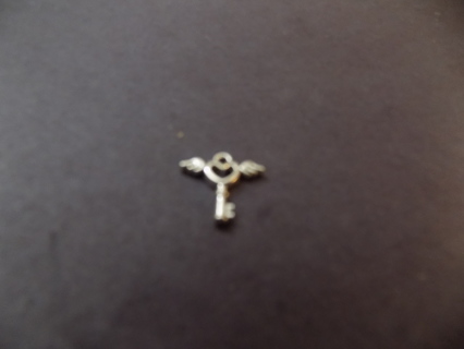 Silvertone key with wings charm small # 2