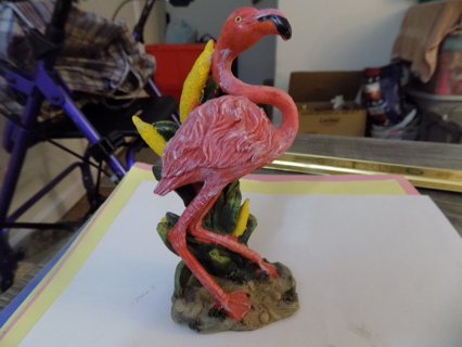  6 inch tall pink flamingo with yellow flowers