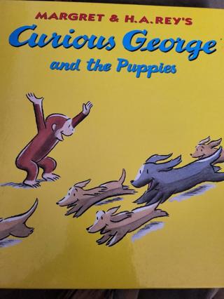 Curious George and the Puppies