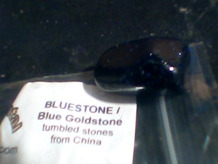 Blue stone and black ones