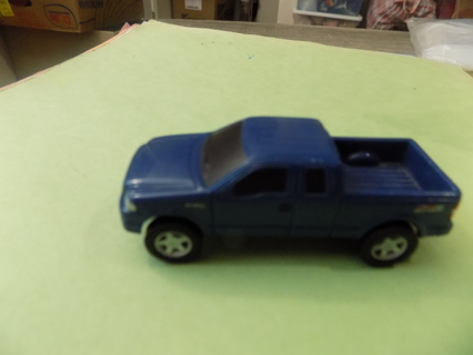 Diecast car 2004 blue pick up truck Ford motor company