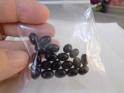 Baggie black wooden oval beads