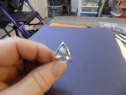 Silvertone ring size 6 with turquoise stone inside triangle