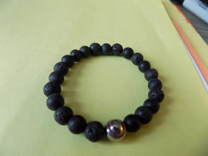 Bracelet onxy  all black lava beads with silvertone baseball 