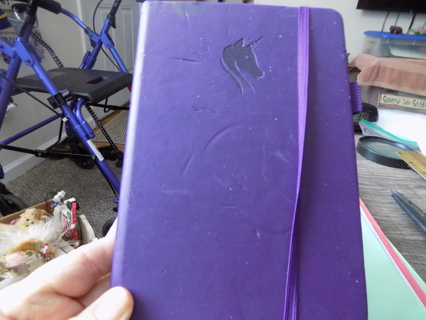 Purple leather unicorn embossed tabbed address book