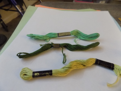 3 skiens of different shades of green embrodery floss