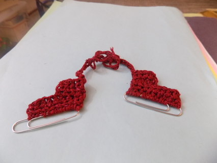 Pair of hand crocheted marroon thread ice skates ornament with metal paper clip runners