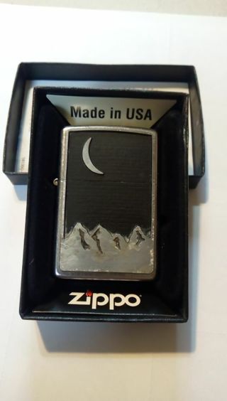 ZIPPO WINDPROOF LIGHTER.. MARKED 2000 ON BOTTOM