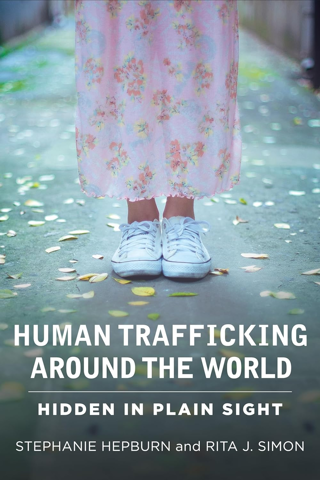Human Trafficking Around the World: Hidden in Plain Sight * Illustrated Edition * (Paperback)