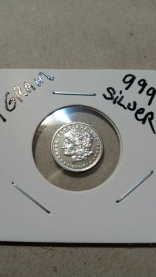 1- GRAM -.999 PURE SILVER ROUND...MORGAN DOLLAR DESIGN