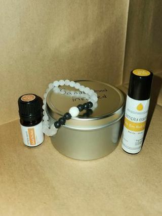 Sandalwood infused candle, lava bead bracelet, defeat the reek and up and at em essential oil lot