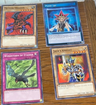 4 yugioh trading cards 