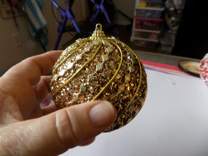 4 inch handmade gold glitter and braid ornament