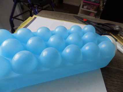 Blue plastic freeze and pop ice tray with screw off lid