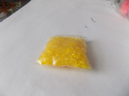 Small baggie yellow cooking crystals for making suncatchers/crafts