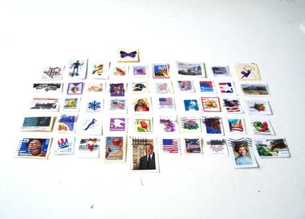 United States Postage Stamps used set of 50 still on paper