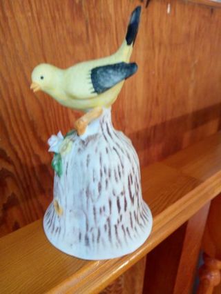 PORCELAIN BELL. WITH BIRD ON TOP