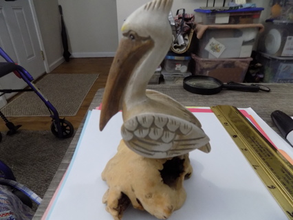 6 inch hand carved wooden pelican on dried mushroom base Unusual