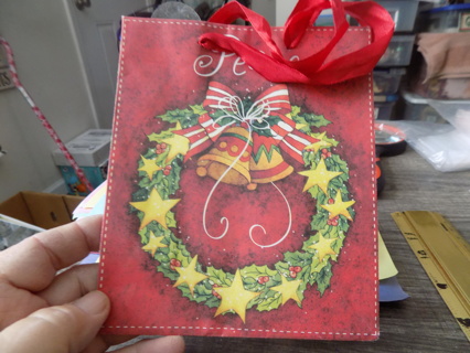 Small red peace and wreath gift bag